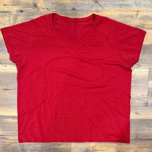 Lululemon red swiftly shirt. Either a size 12 or 14.